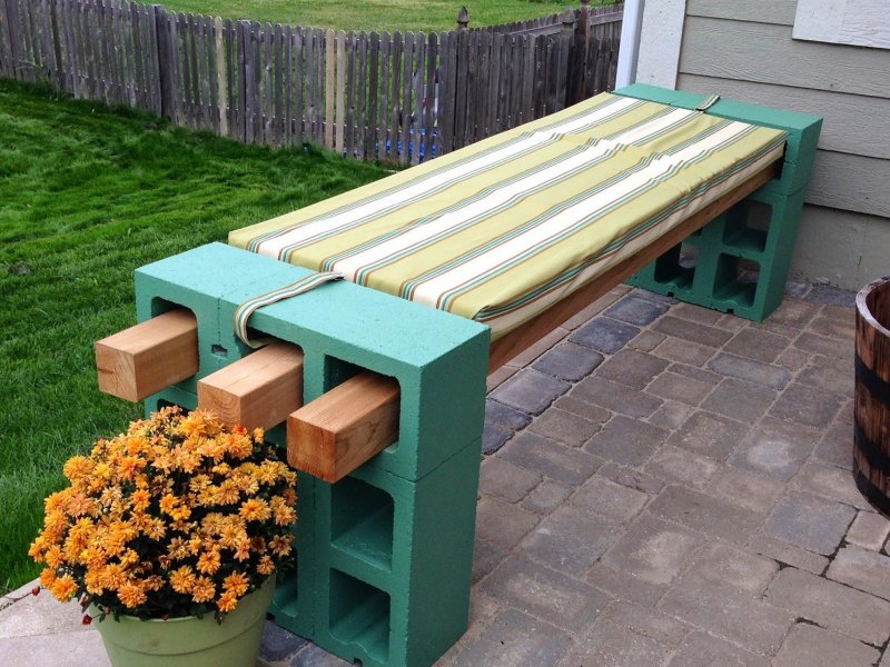 4. Cinderblock Bench with a Pop of Color